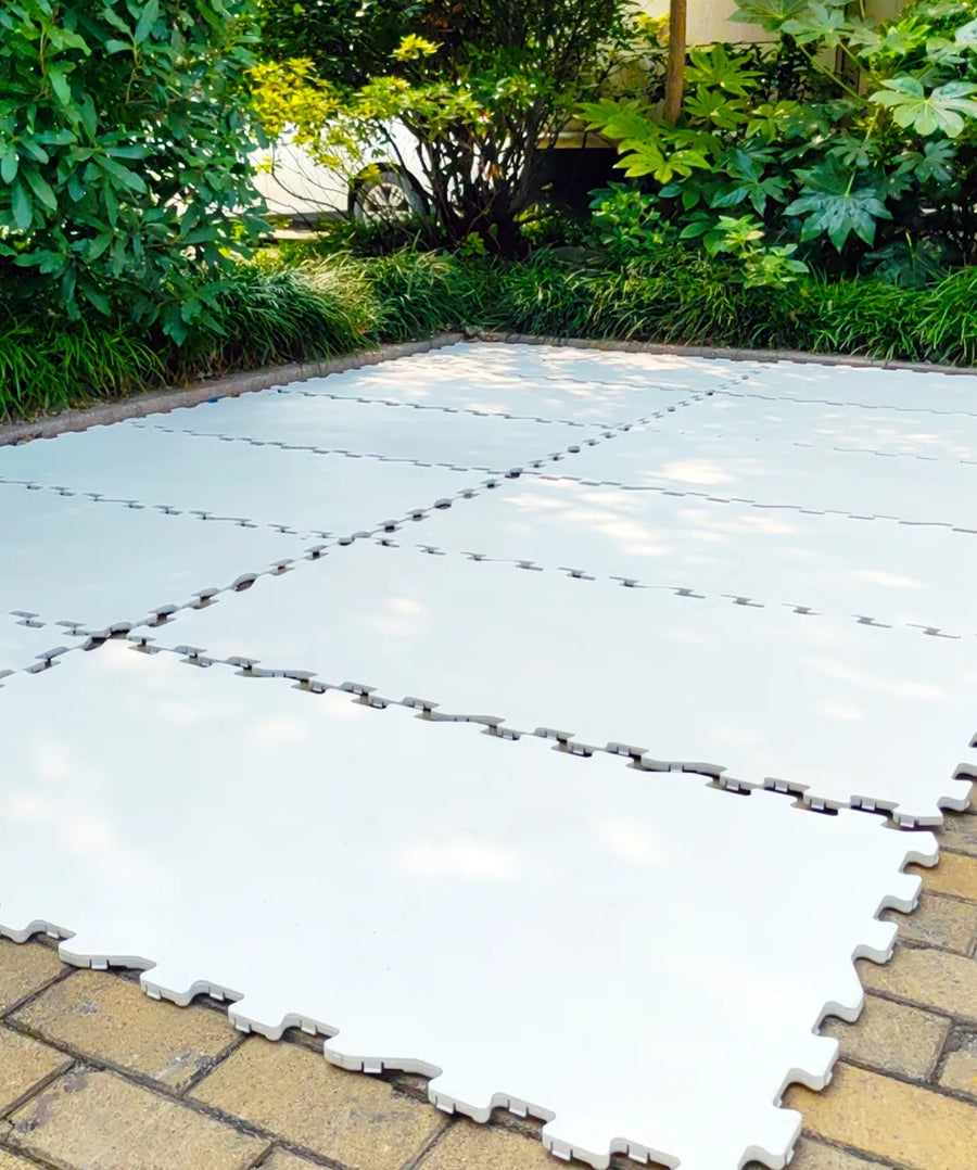 ArcticGlide Pro panels installed outdoors on a paved patio