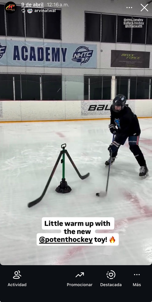 Player in black practicing a puck move beside Spin Defender on ice
